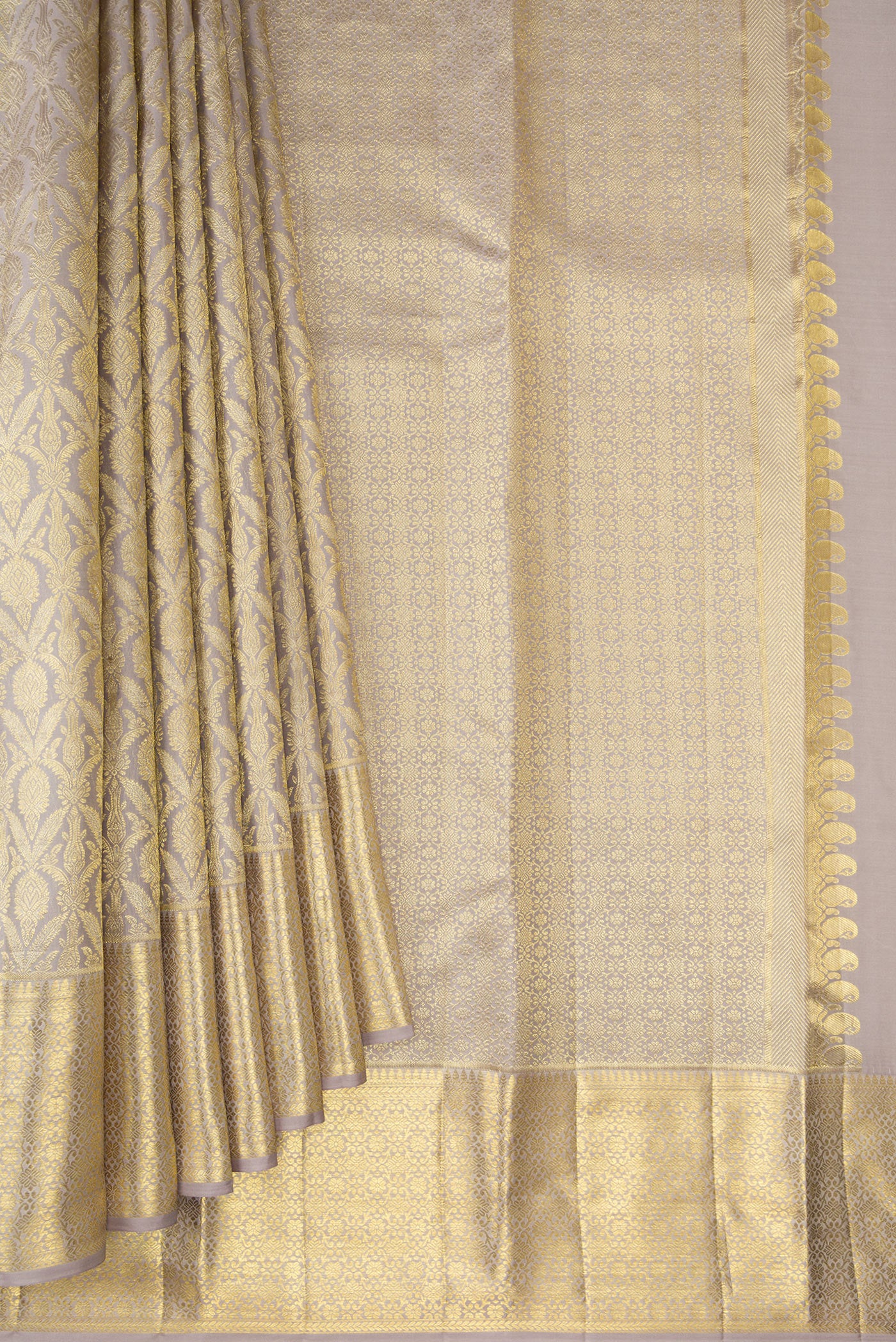 Pleats and pallu of Davys Grey Kanchipuram Silk Saree with Zari Brocade on the body and Zari Border. 