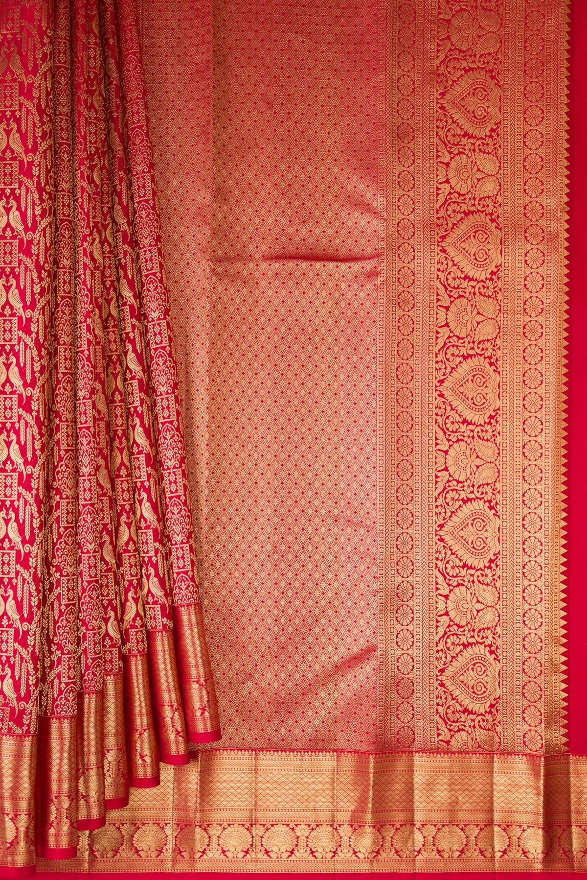 Pleats and pallu of Pure Silk Red Dual Tone Kanchipuram Saree with Zari Brocade on the body and Zari Border. 