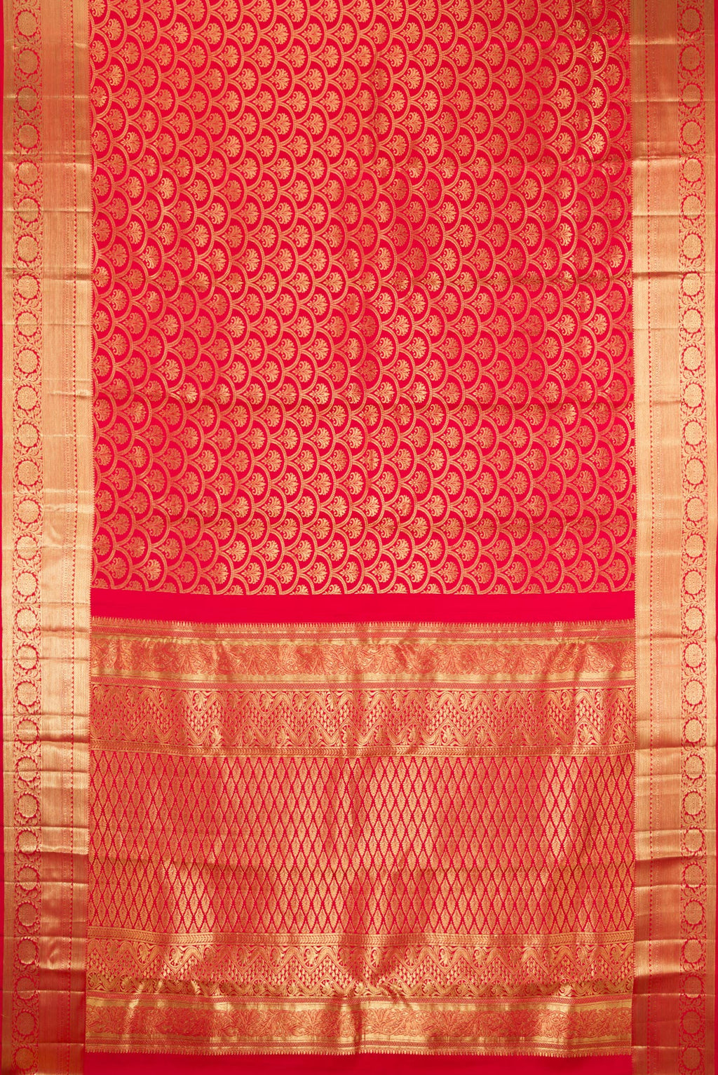 Flat view of Red Kanchipuram Silk Saree with Zari Brocade on the body and Zari Border. 