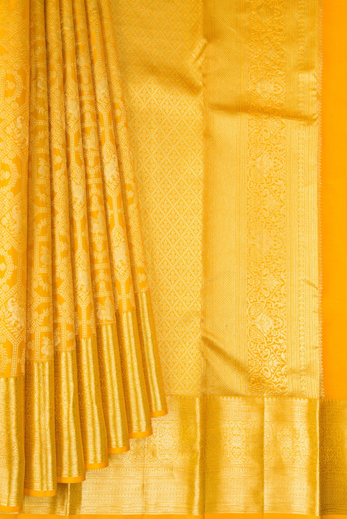 Pleats and pallu of Pure Silk Yellow Kanchipuram Saree with Zari Brocade on the body and Zari Border. 