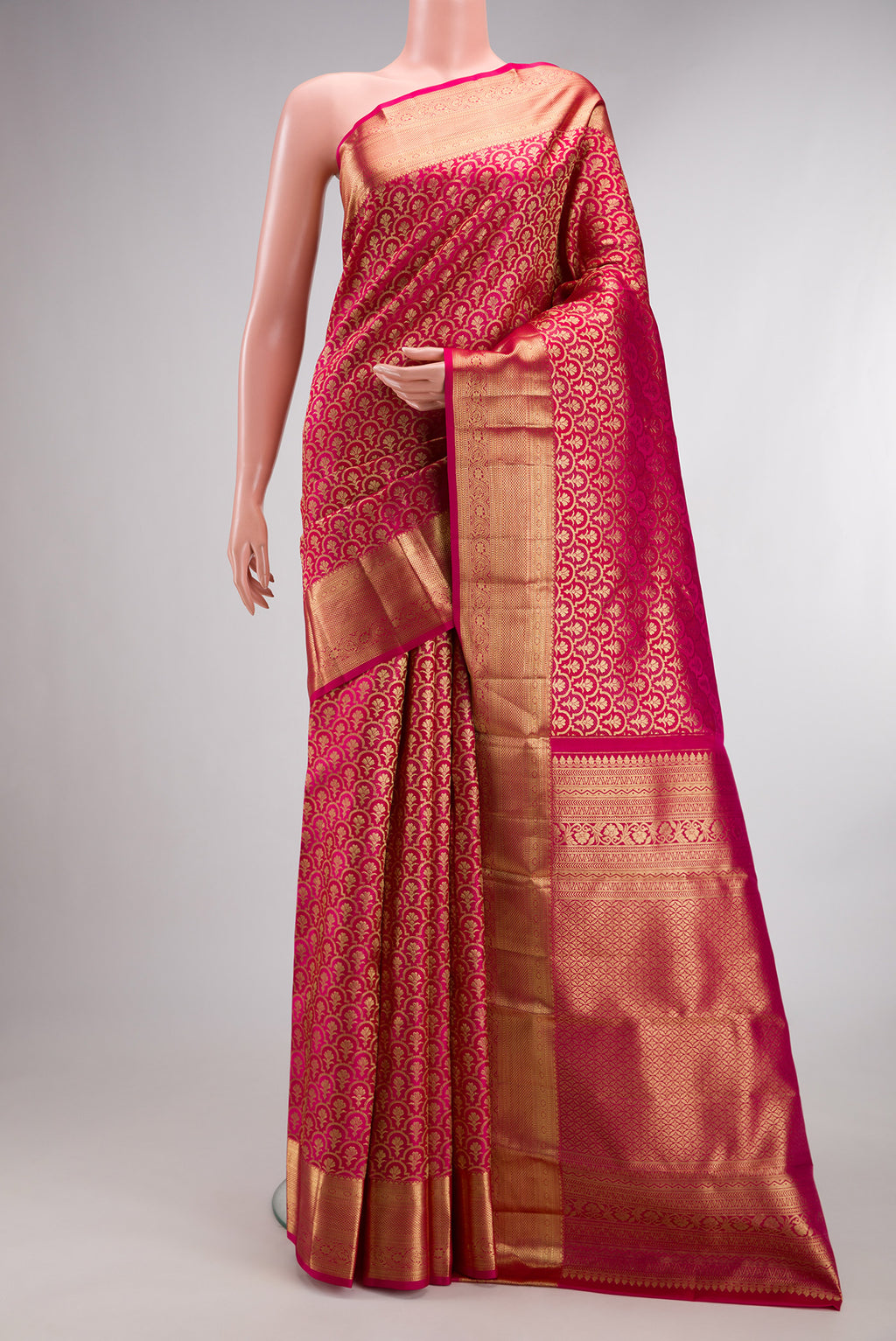 Pure Silk Dark Pink Dual Tone Kanchipuram Saree with Zari Brocade on the body and Zari Border.  displayed on a mannequin