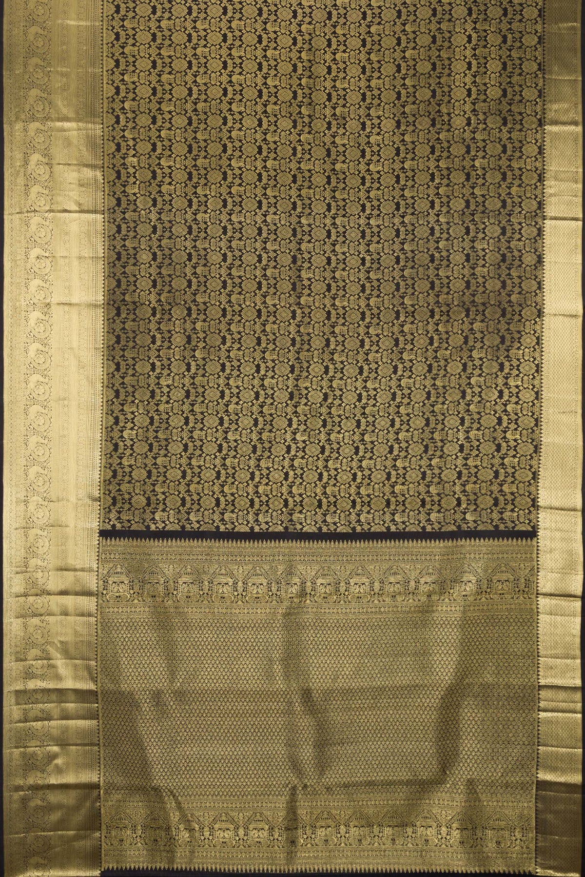 Flat view of Pure Silk Black Kanchipuram Saree with Zari Brocade on the body and Zari Border. 