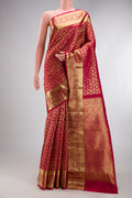 Pure Silk Rani Pink Kanchipuram Saree with Zari Brocade on the body and Zari Border.  displayed on a mannequin