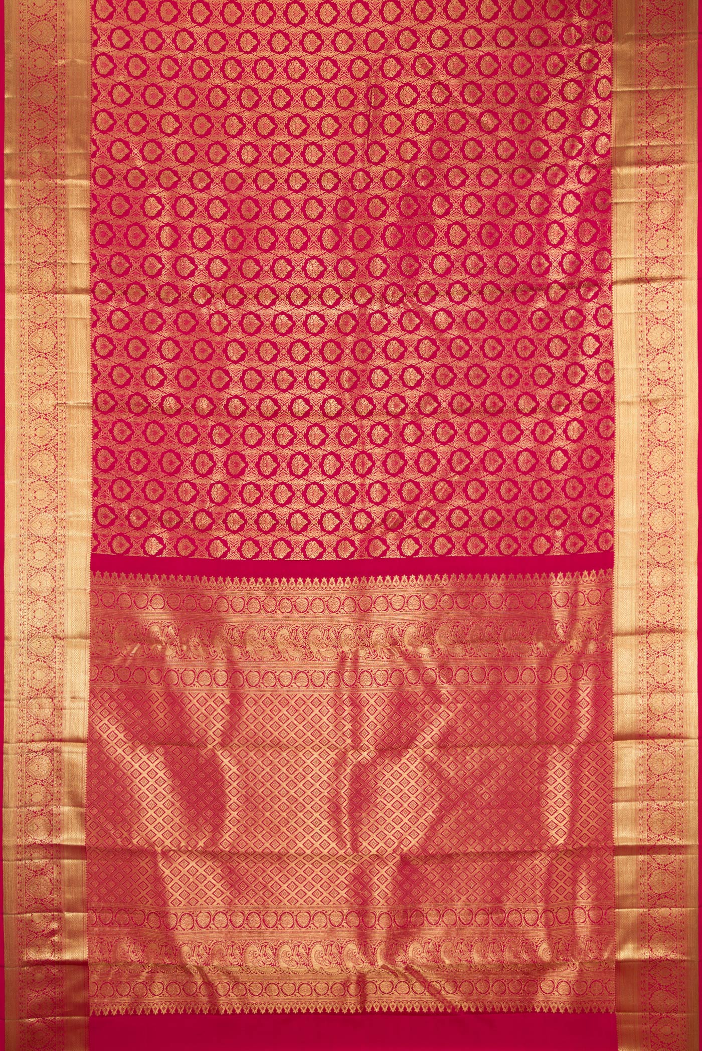 Flat view of Pure Silk Rani Pink Kanchipuram Saree with Zari Brocade on the body and Zari Border. 