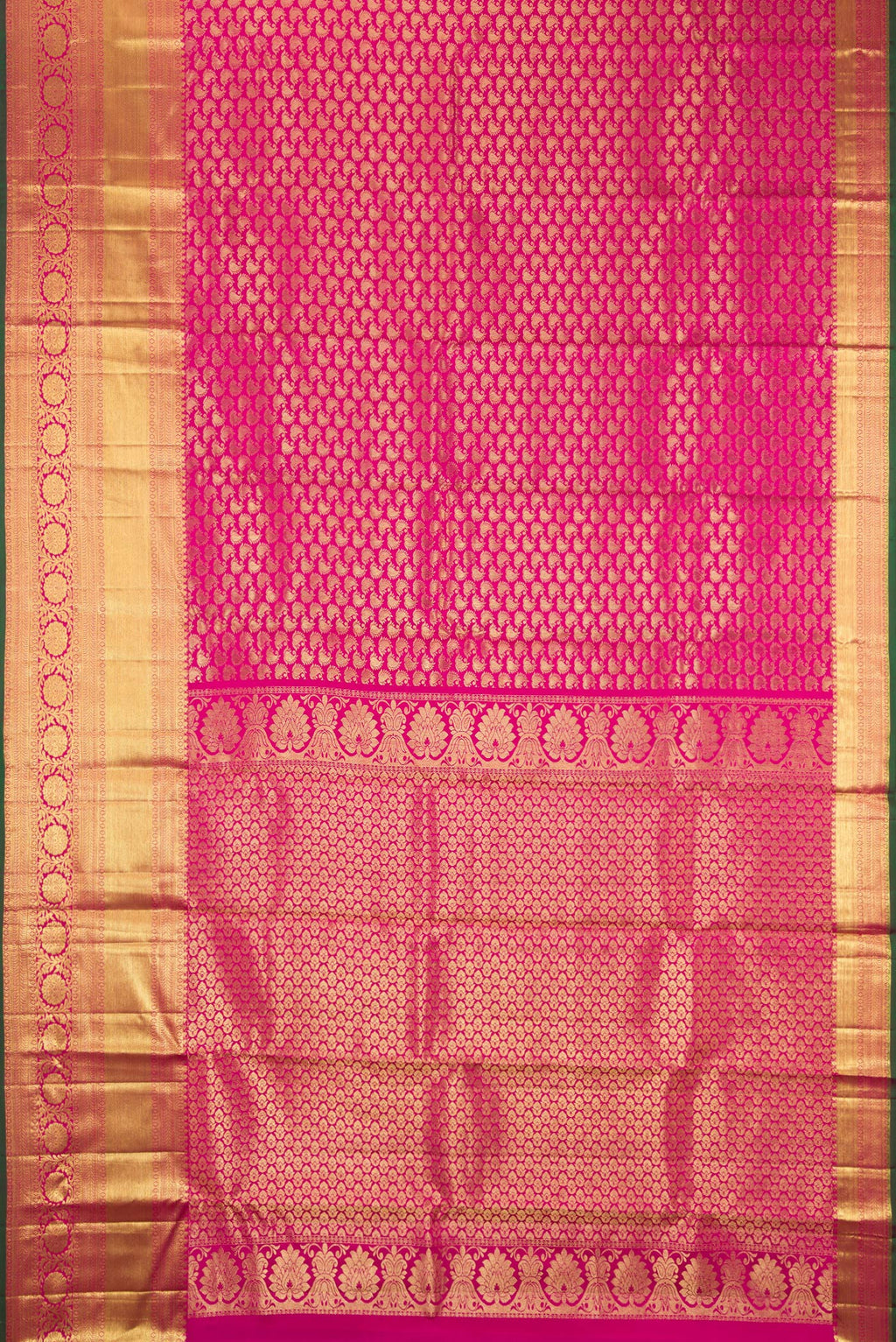 Flat view of Rani Pink Kanchipuram Silk Saree with Zari Brocade on the body and Zari Border. 