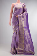 Lavender Kanchipuram Silk Saree with Zari Brocade on the body and Zari Border.  displayed on a mannequin