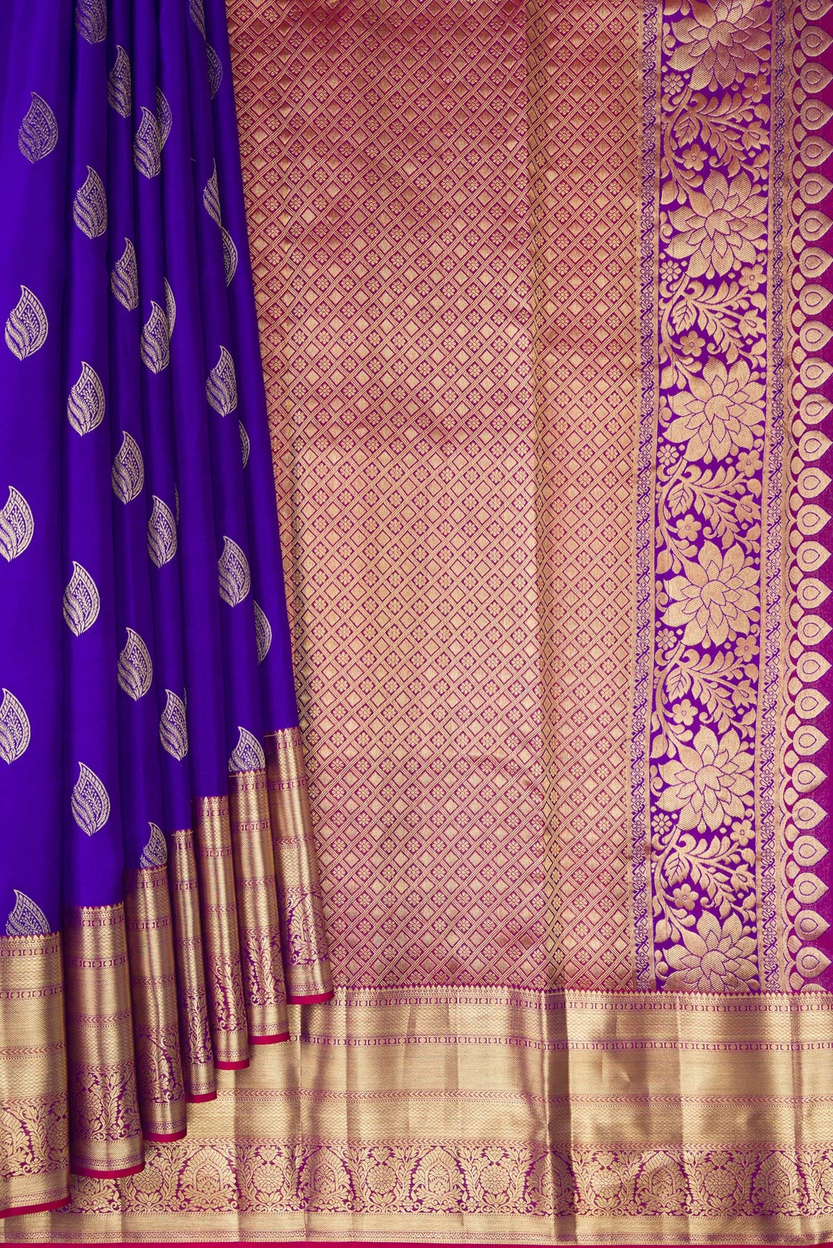 Pleats and pallu of Pure Silk Royal Blue Kanchipuram Saree with Zari Butta on the body and Zari Border. 