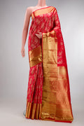 Red Kanjivaram Silk Saree with Zari Brocade on the body and Zari Border.  displayed on a mannequin