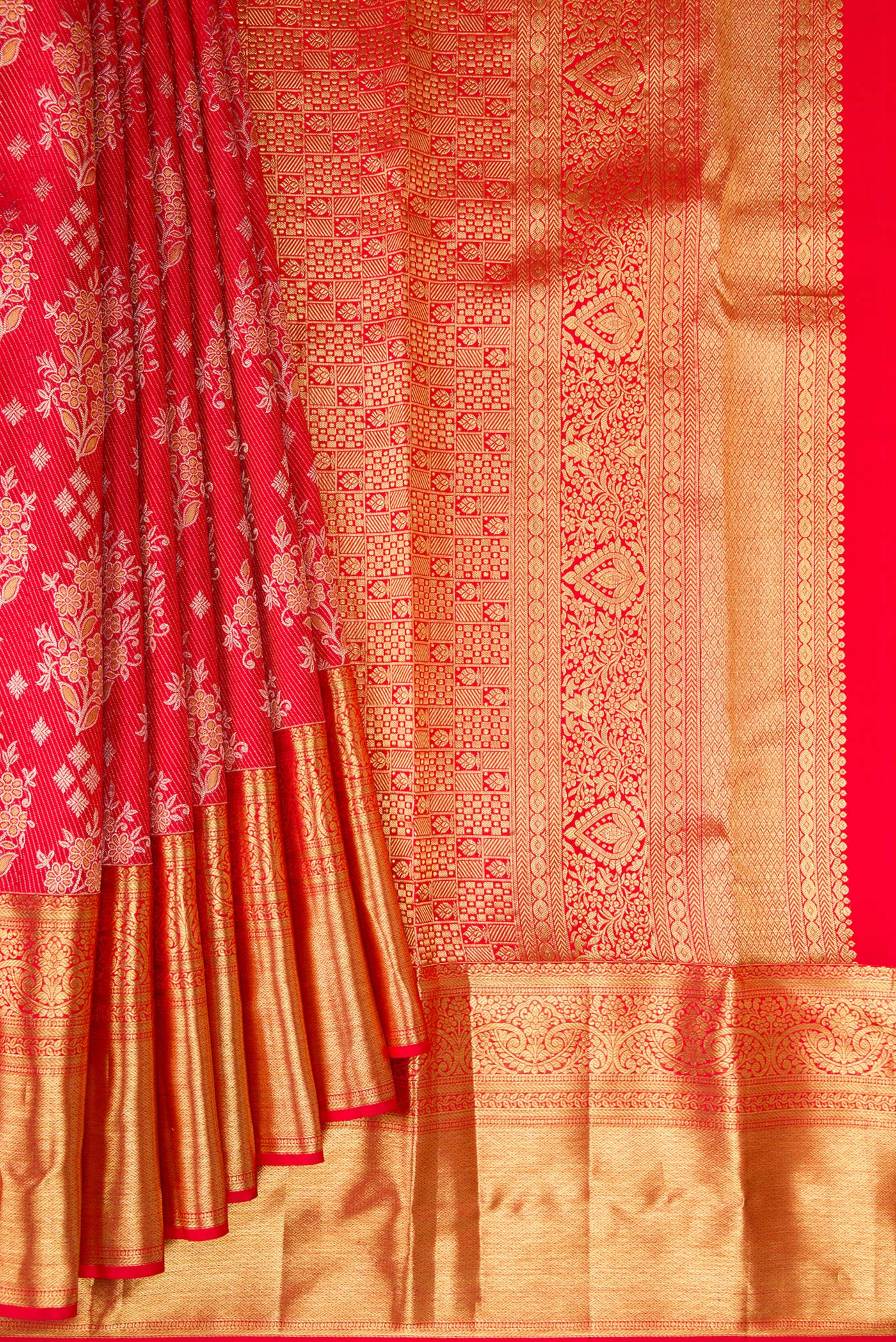 Pleats and pallu of Red Kanjivaram Silk Saree with Zari Brocade on the body and Zari Border. 
