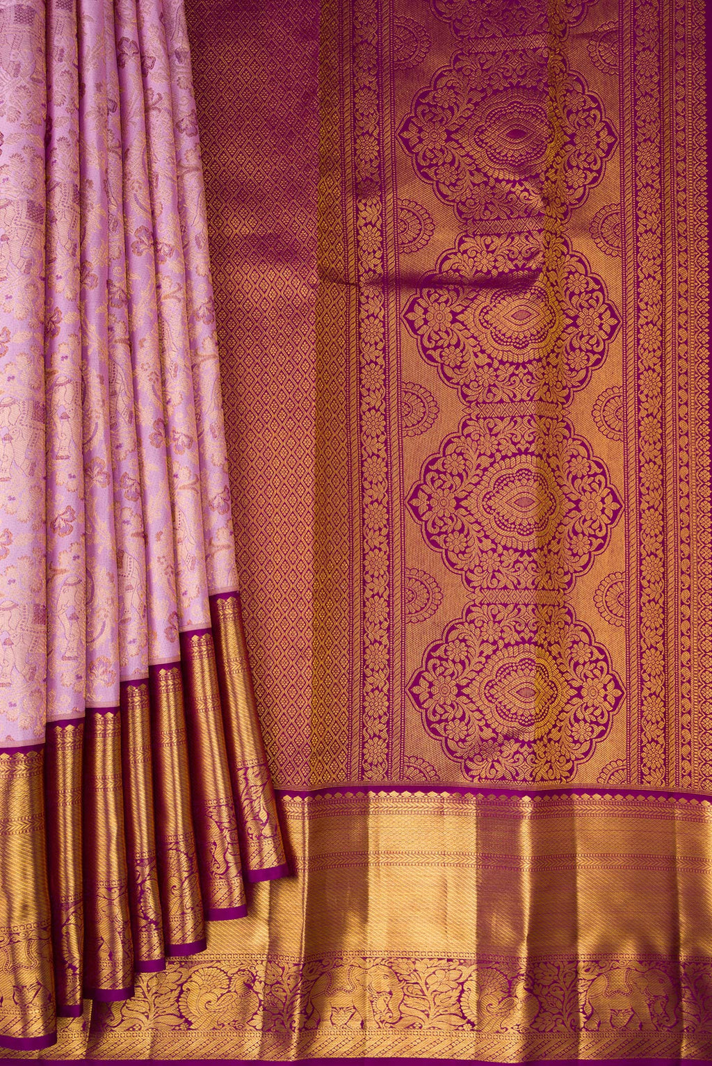 Pleats and pallu of Lavender Kanjivaram Silk Saree with Zari Brocade on the body and Zari Border. 