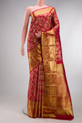 Maroon Kanjivaram Silk Saree with Zari Brocade on the body and Zari Border.  displayed on a mannequin