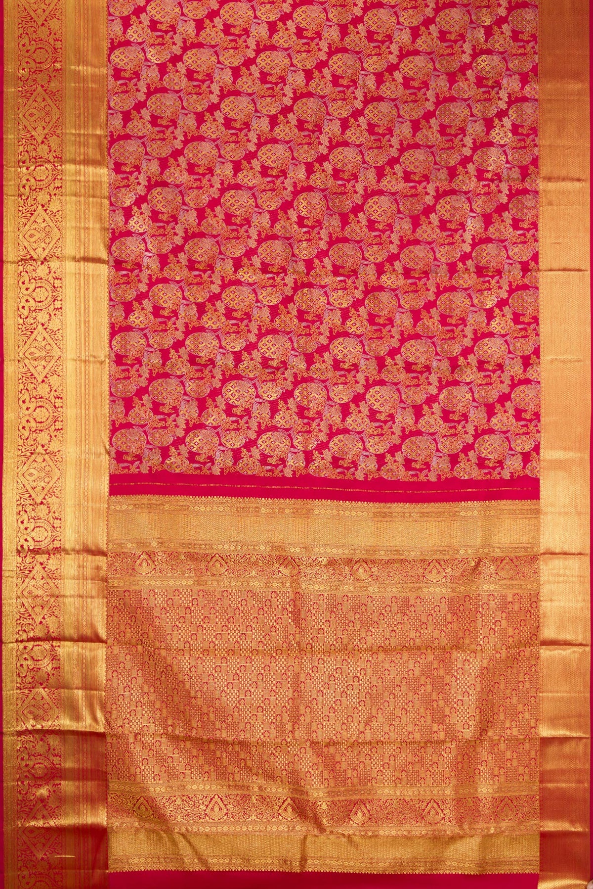 Flat view of Maroon Kanjivaram Silk Saree with Zari Brocade on the body and Zari Border. 