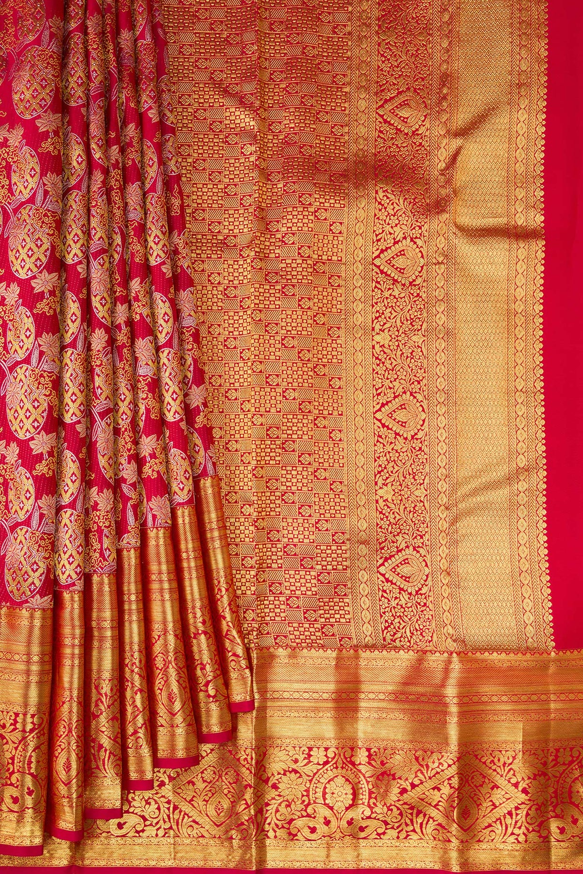Pleats and pallu of Maroon Kanjivaram Silk Saree with Zari Brocade on the body and Zari Border. 