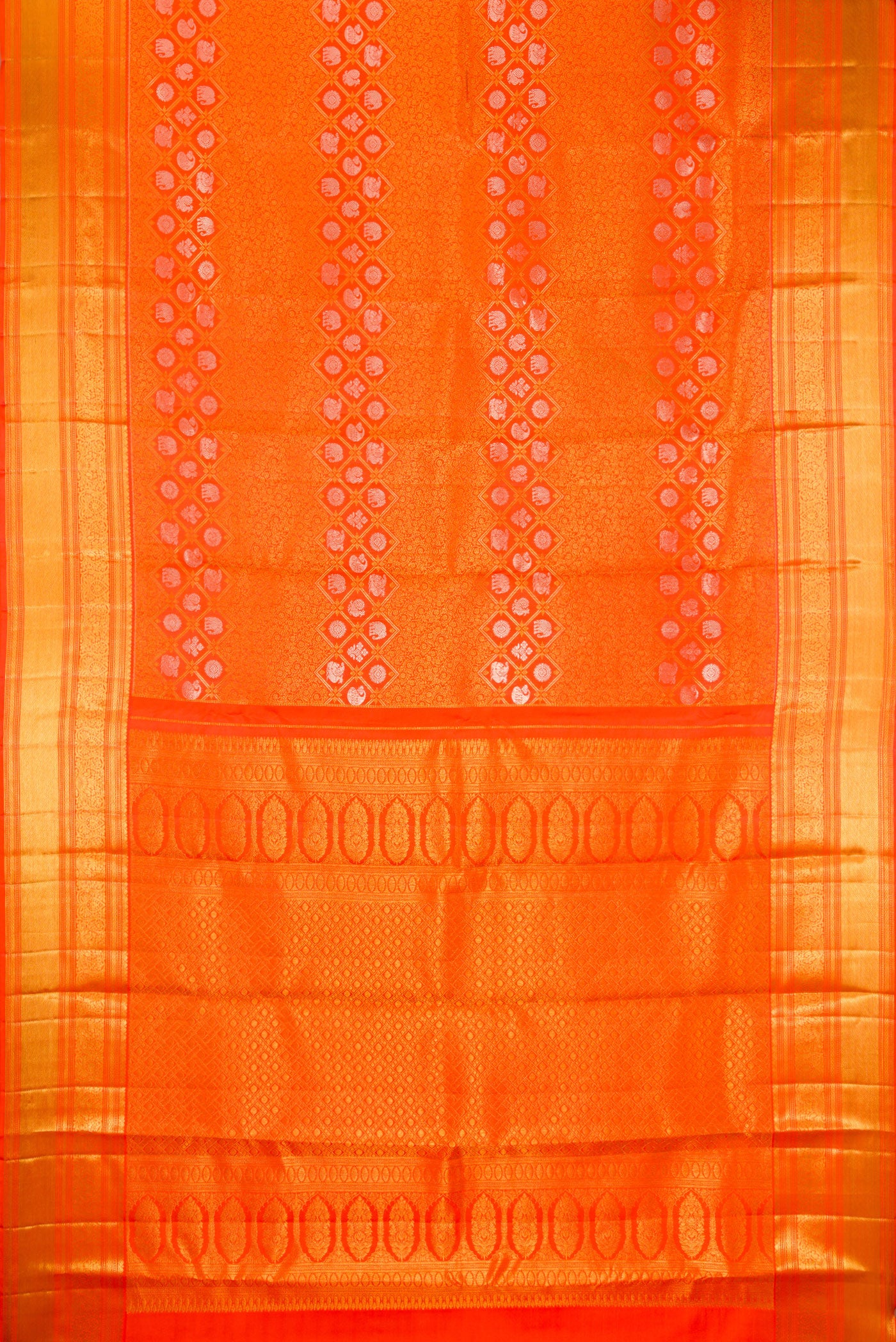 Flat view of Orange Kanjivaram Silk Saree with Zari Brocade on the body and Zari Border. 