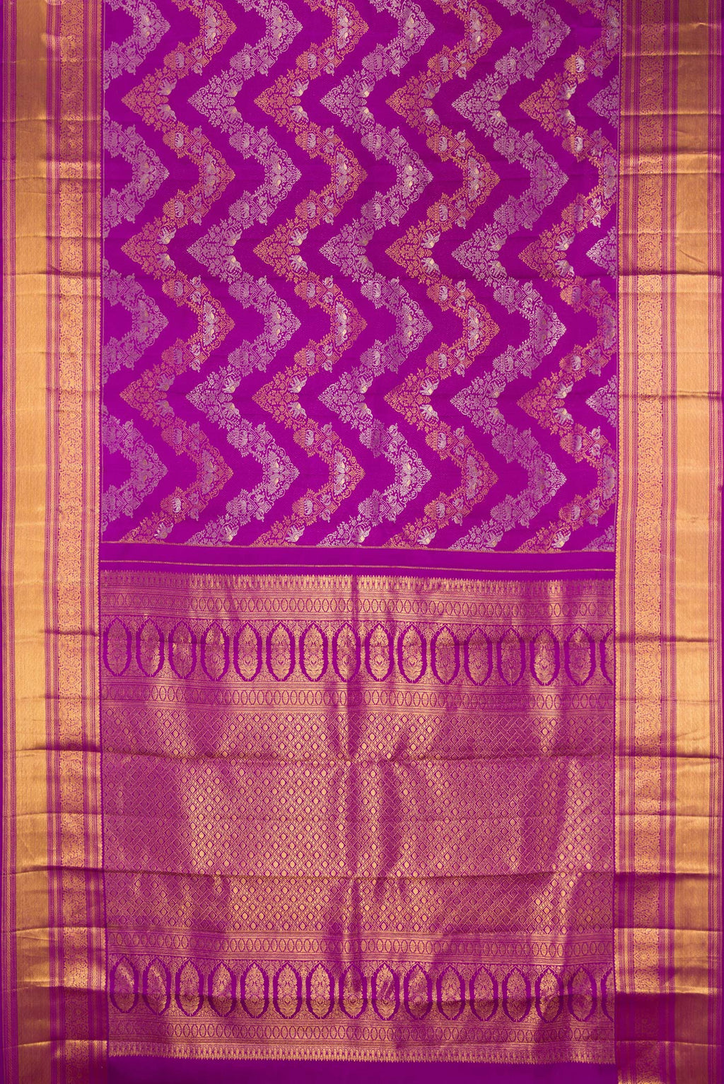 Flat view of Pure Silk Purple Kanjivaram Saree with Zari Brocade on the body and Zari Border. 