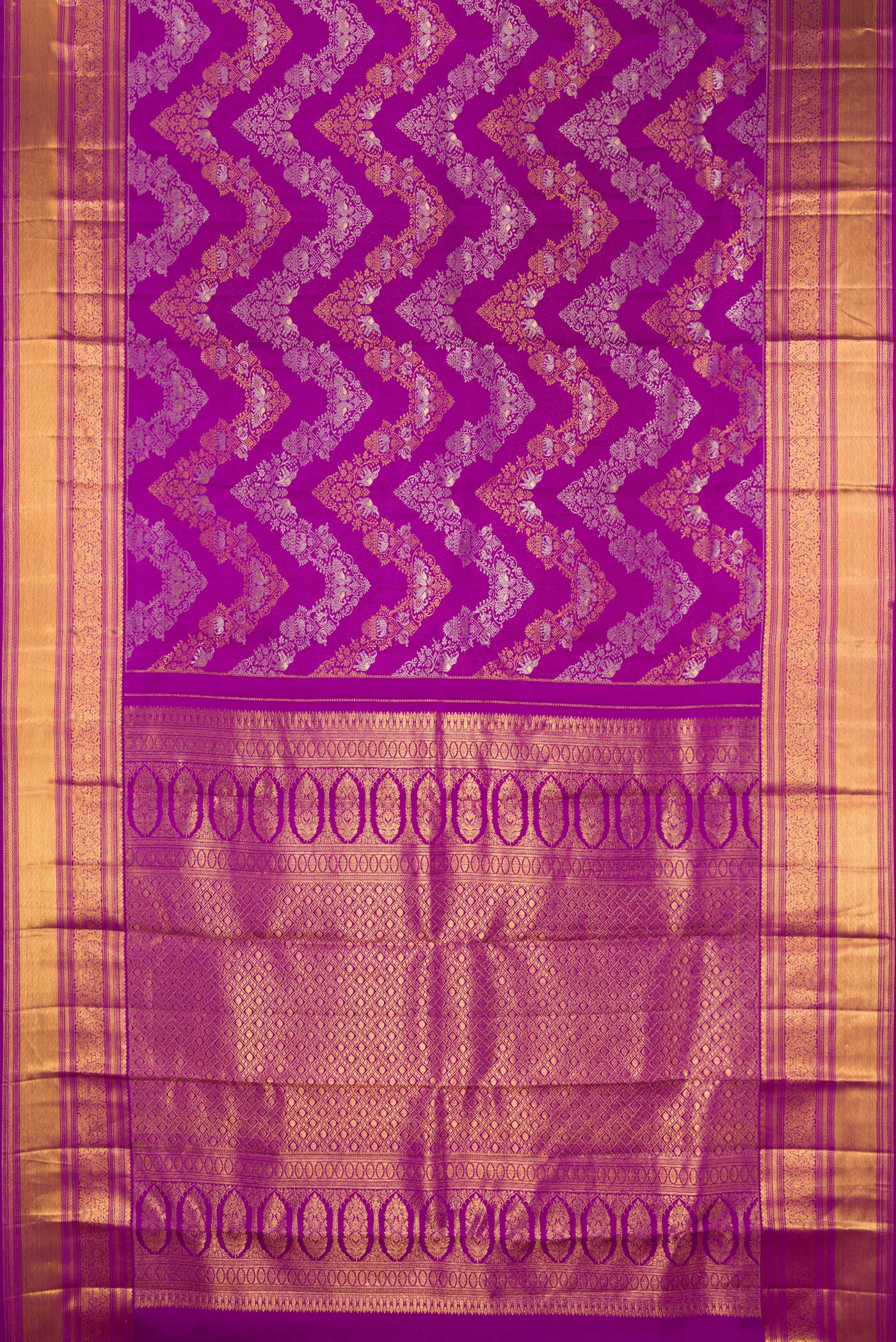 Flat view of Pure Silk Purple Kanjivaram Saree with Zari Brocade on the body and Zari Border. 
