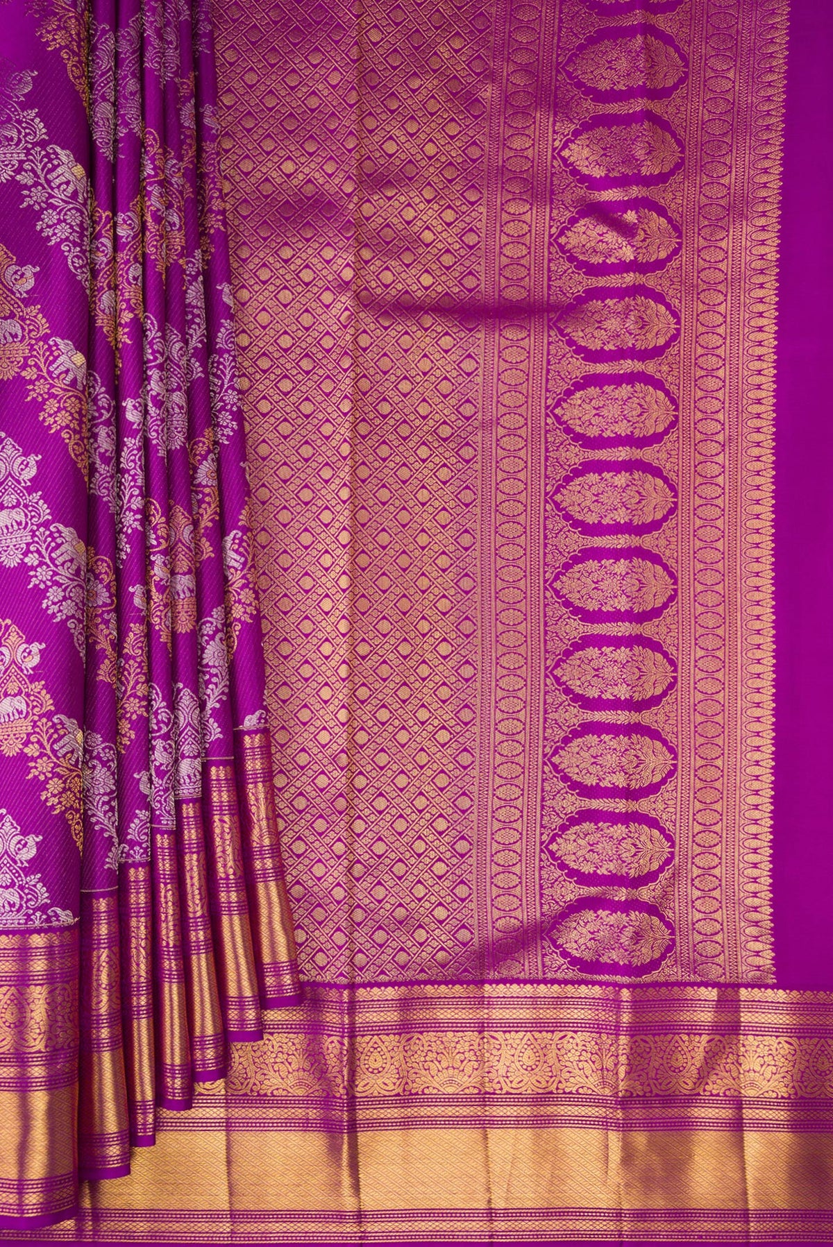 Pleats and pallu of Pure Silk Purple Kanjivaram Saree with Zari Brocade on the body and Zari Border. 