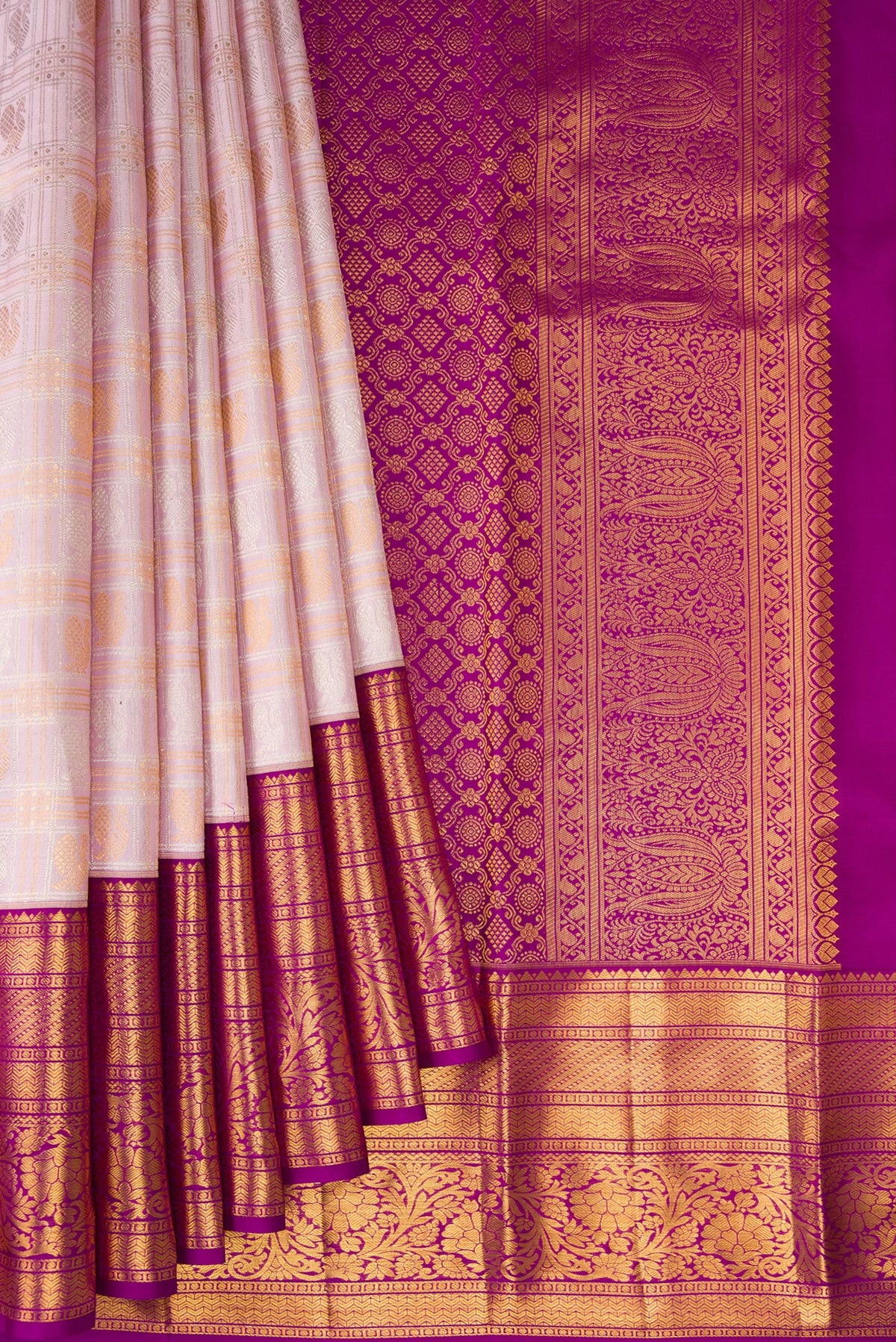 Pleats and pallu of Lilac Kanjivaram Silk Saree with Checked design on the body and Zari Border. 