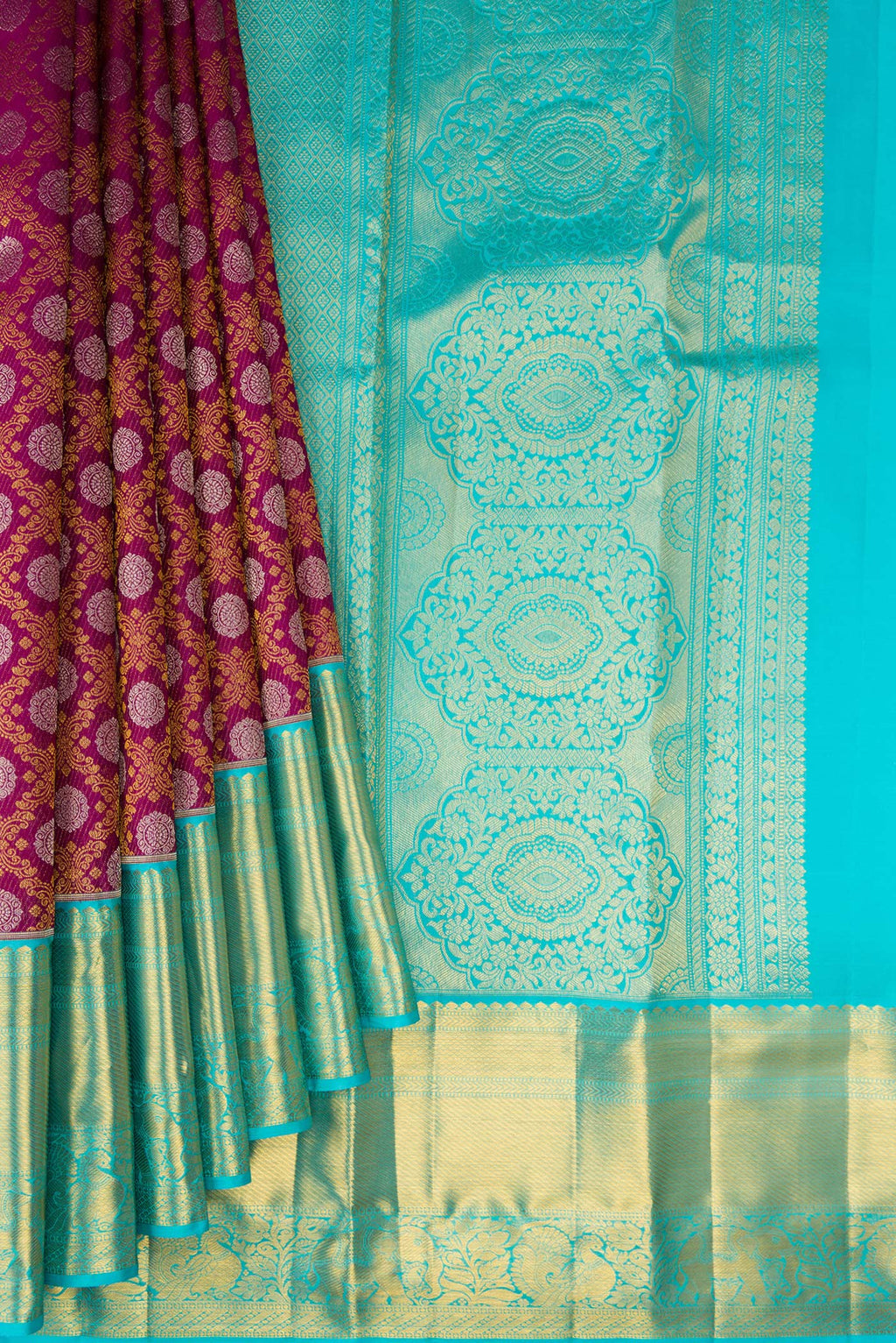 Pleats and pallu of Pure Silk Magenta Kanjivaram Saree with Zari Brocade on the body and Zari Border. 