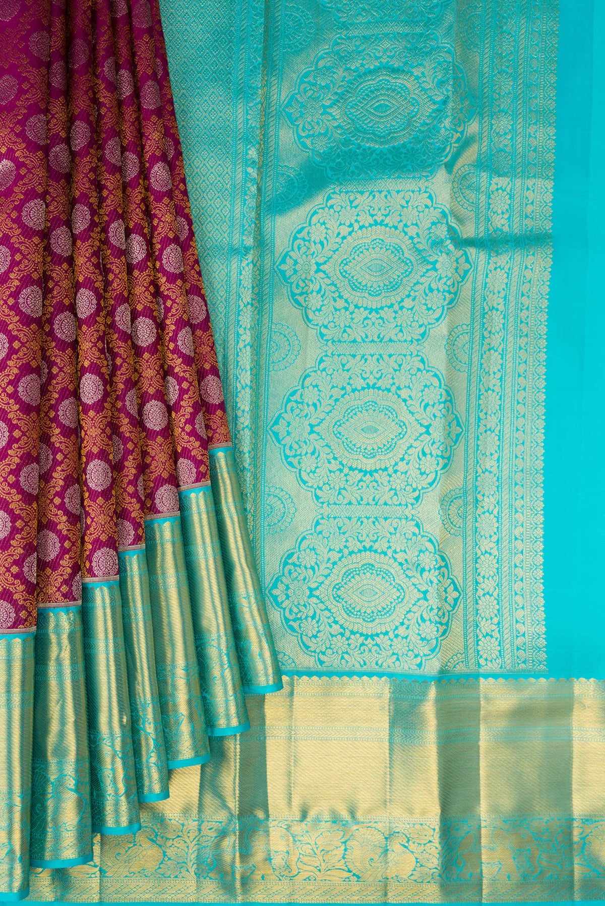 Pleats and pallu of Pure Silk Magenta Kanjivaram Saree with Zari Brocade on the body and Zari Border. 