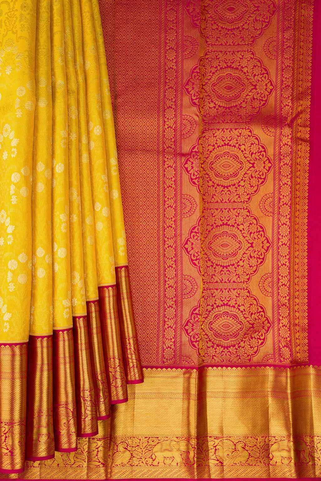 Pleats and pallu of Pure Silk Mustard Kanjivaram Saree with Zari Brocade on the body and Zari Border. 