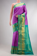 Pure Silk Lavender Kanjivaram Saree with Zari Brocade on the body and Zari Border.  displayed on a mannequin