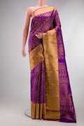 Purple Kanjivaram Silk Saree with Zari Brocade on the body and Zari Border.  displayed on a mannequin