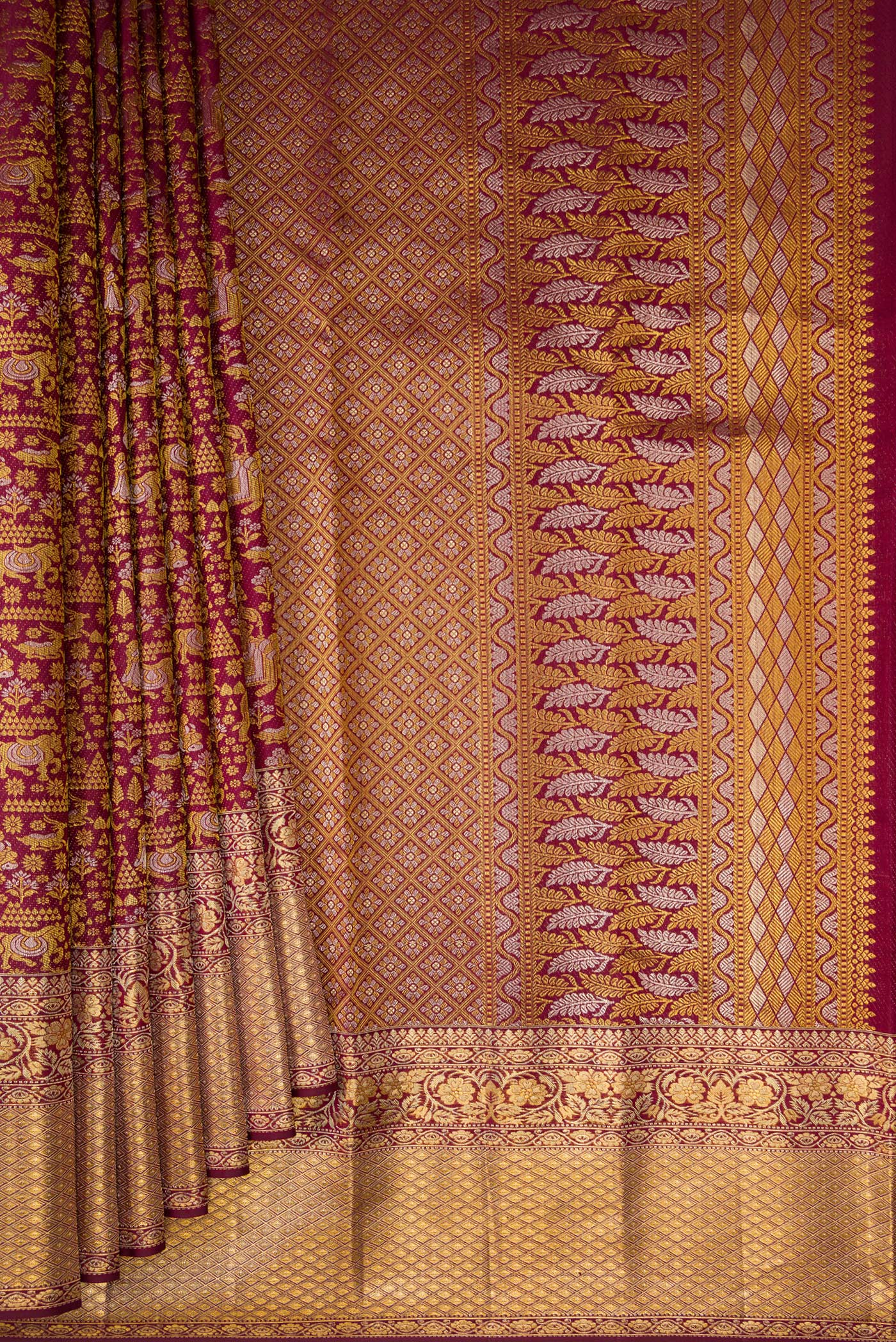 Pleats and pallu of Pure Silk Maroon Kanjivaram Saree with Zari Brocade on the body and Zari Border. 