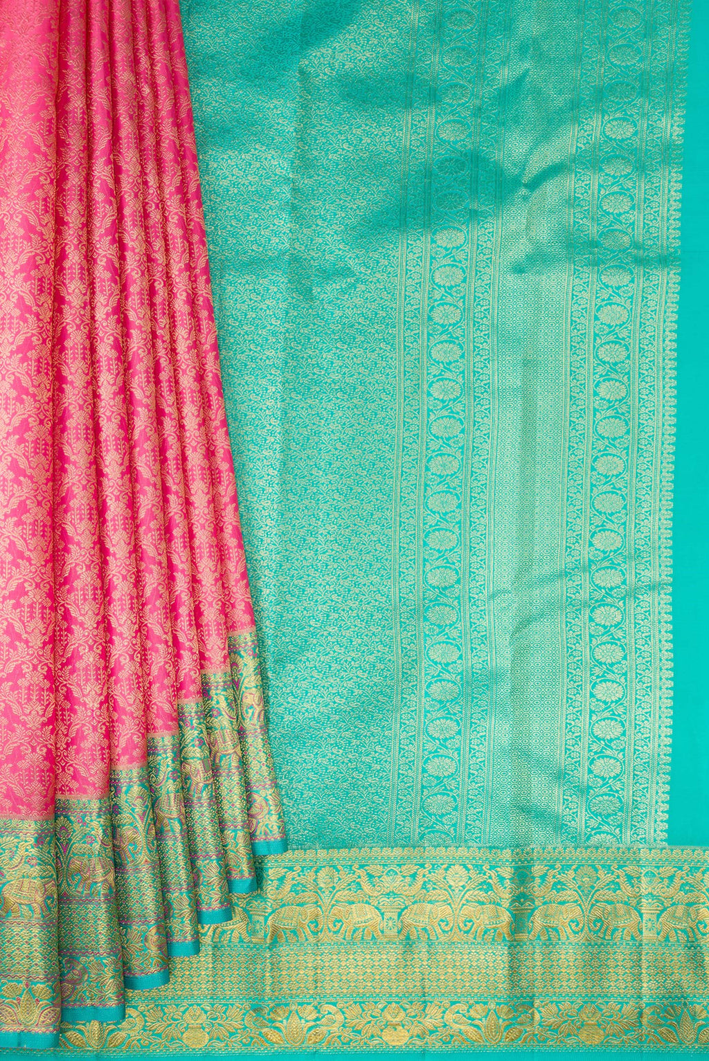 Pleats and pallu of Pure Silk Rose pink Kanjivaram Saree with Zari Brocade on the body and Fancy Border. 
