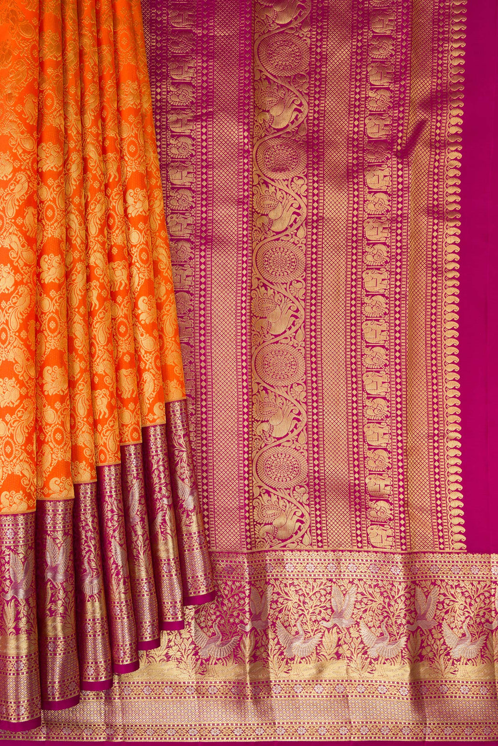 Pleats and pallu of Pure Silk Orange Kanjivaram Saree with Zari Brocade on the body and Fancy Border. 