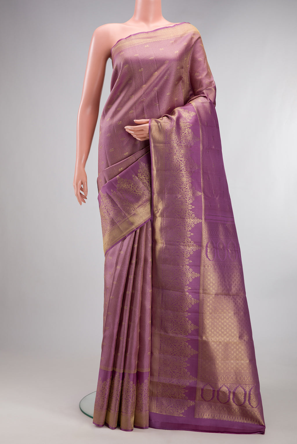 Pure Silk Mauve Dual Tone Kanchipuram Saree with Zari Brocade on the body and Zari Border.  displayed on a mannequin
