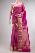 Pure Silk Rani Pink Kanchipuram Saree with Zari Brocade on the body and Fancy Border.  displayed on a mannequin