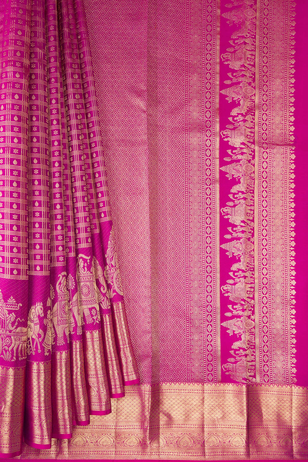 Pleats and pallu of Pure Silk Rani Pink Kanchipuram Saree with Zari Brocade on the body and Fancy Border. 