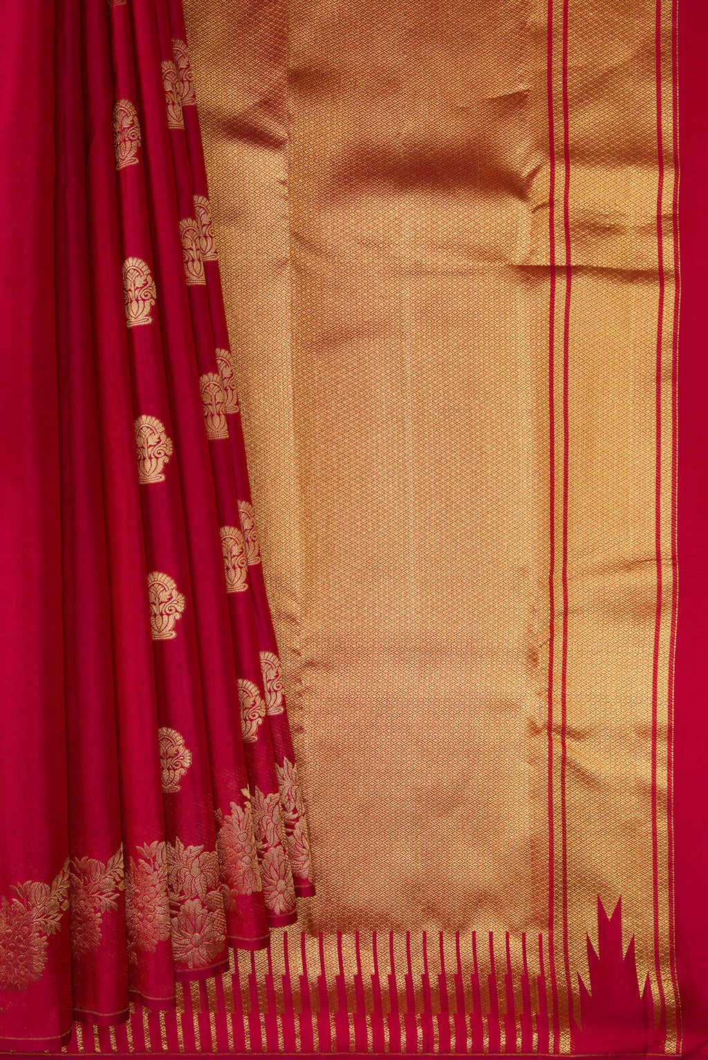 Pleats and pallu of Pure Silk Maroon Kanchipuram Saree with Zari Butta on the body and Fancy Border. 