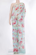 Sky Blue Mysore Chiffon Saree with Printed design on the body and Zari Border.  displayed on a mannequin
