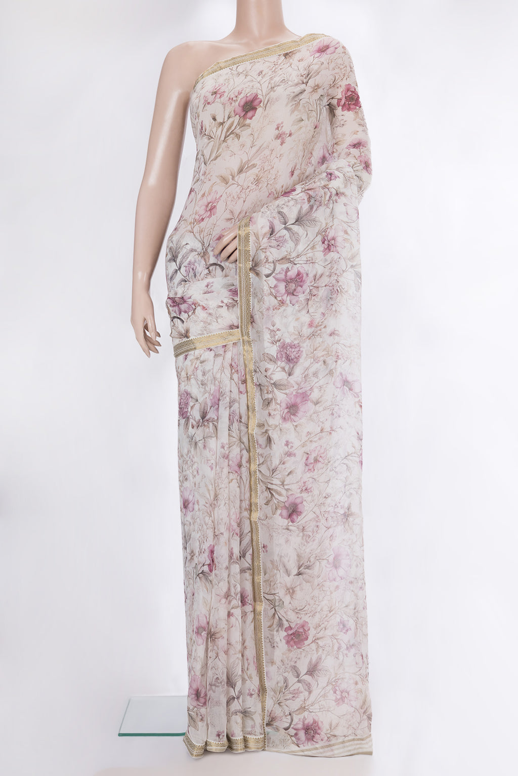 Beige Dual Tone Chiffon Saree with Printed design on the body and Zari Border.  displayed on a mannequin