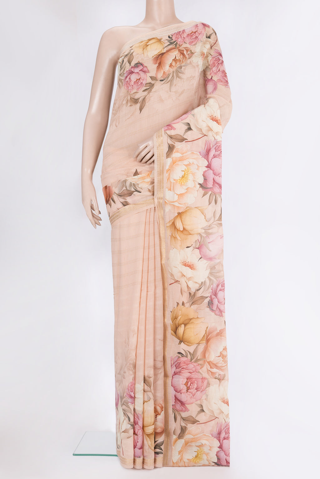 Golden Peach Chanderi Silk Cotton Saree with Printed design on the body and Zari Border.  displayed on a mannequin