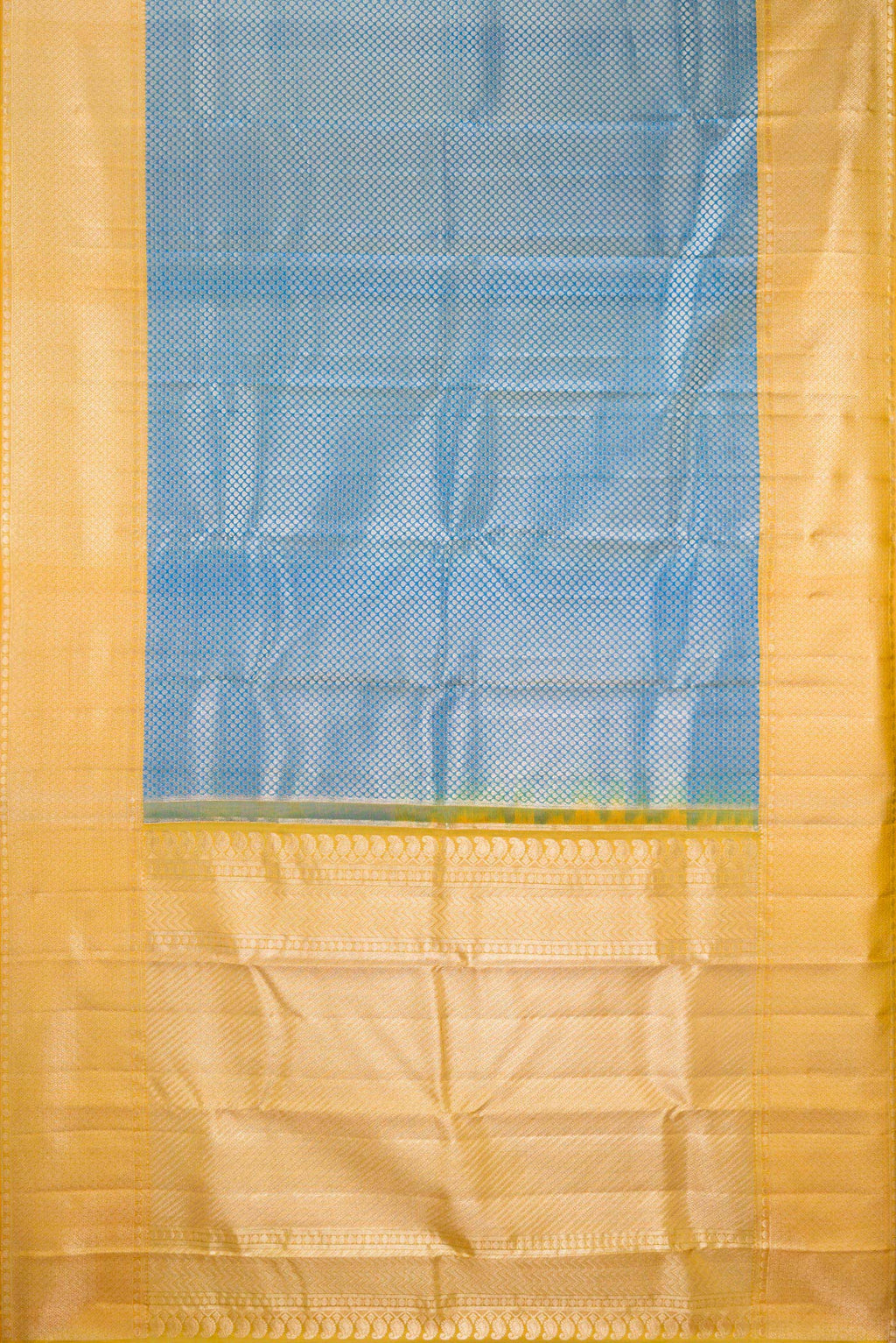 Flat view of Pure Silk Peacock Blue Kanchipuram Tissue Saree with Zari Brocade on the body and Fancy Border. 
