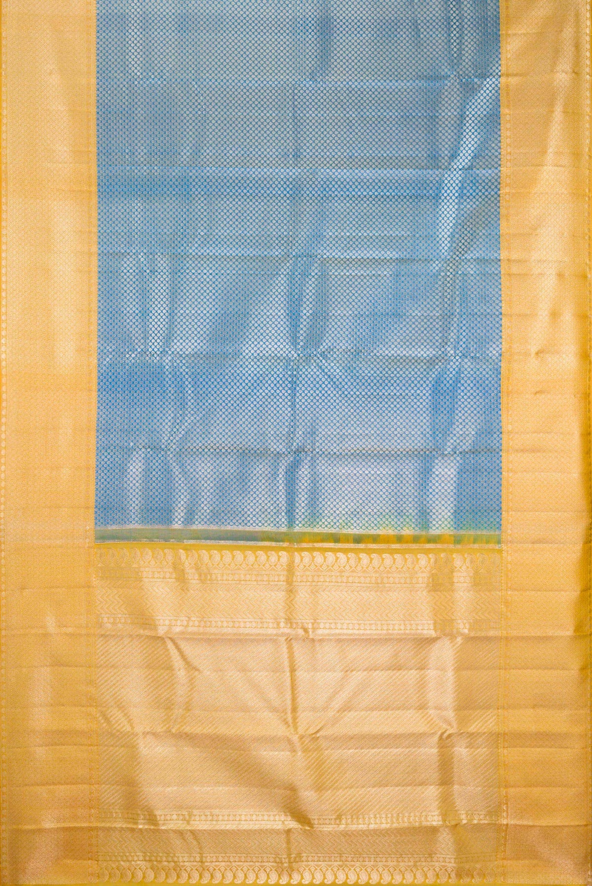 Flat view of Pure Silk Peacock Blue Kanchipuram Tissue Saree with Zari Brocade on the body and Fancy Border. 