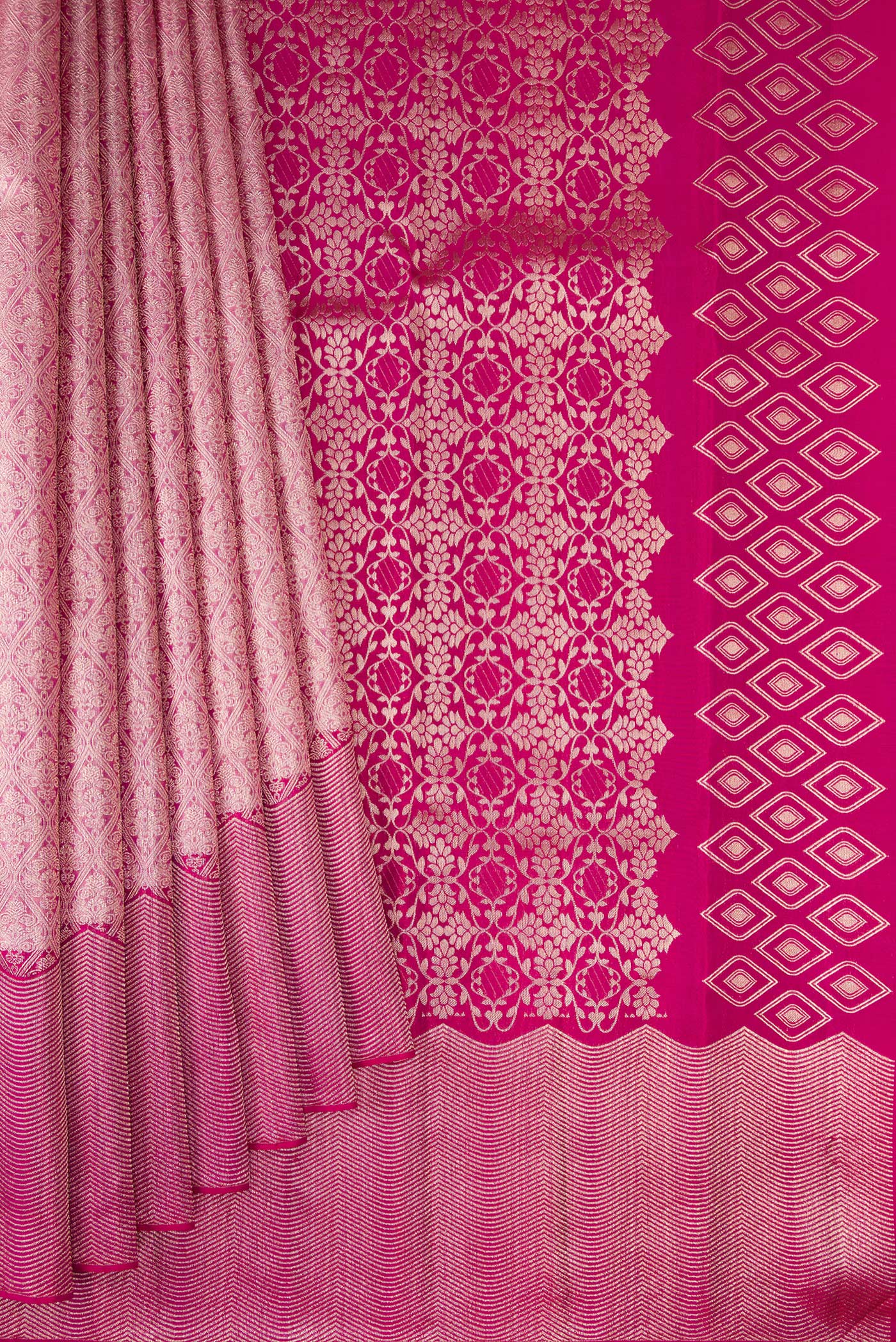 Pleats and pallu of Rose pink Dual Tone Kanchipuram Tissue Silk Saree with Zari Brocade on the body and Fancy Border. 