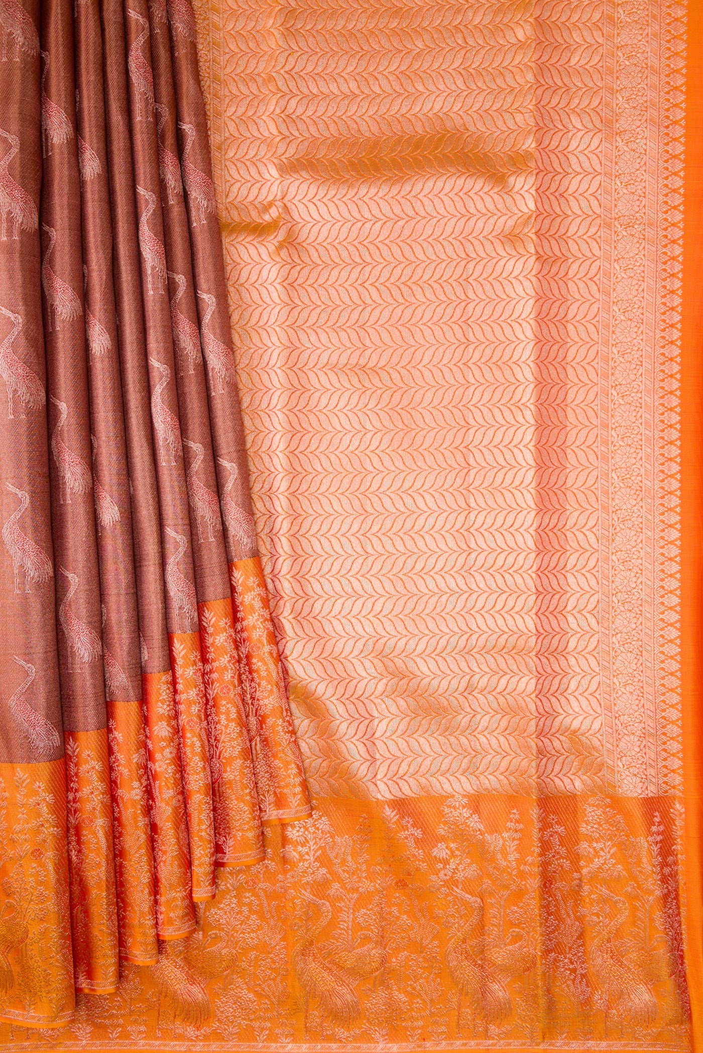 Pleats and pallu of Rose Gold Dual Tone Kanchipuram Tissue Silk Saree with Zari Brocade on the body and Fancy Border. 