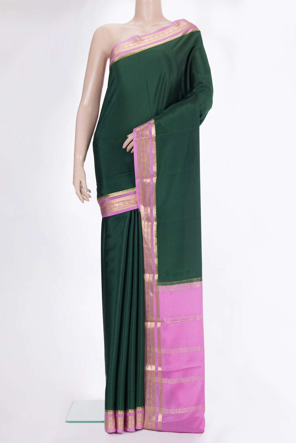 Bottle Green Mysore Crepe Saree with Plain Body and Zari Border.  displayed on a mannequin