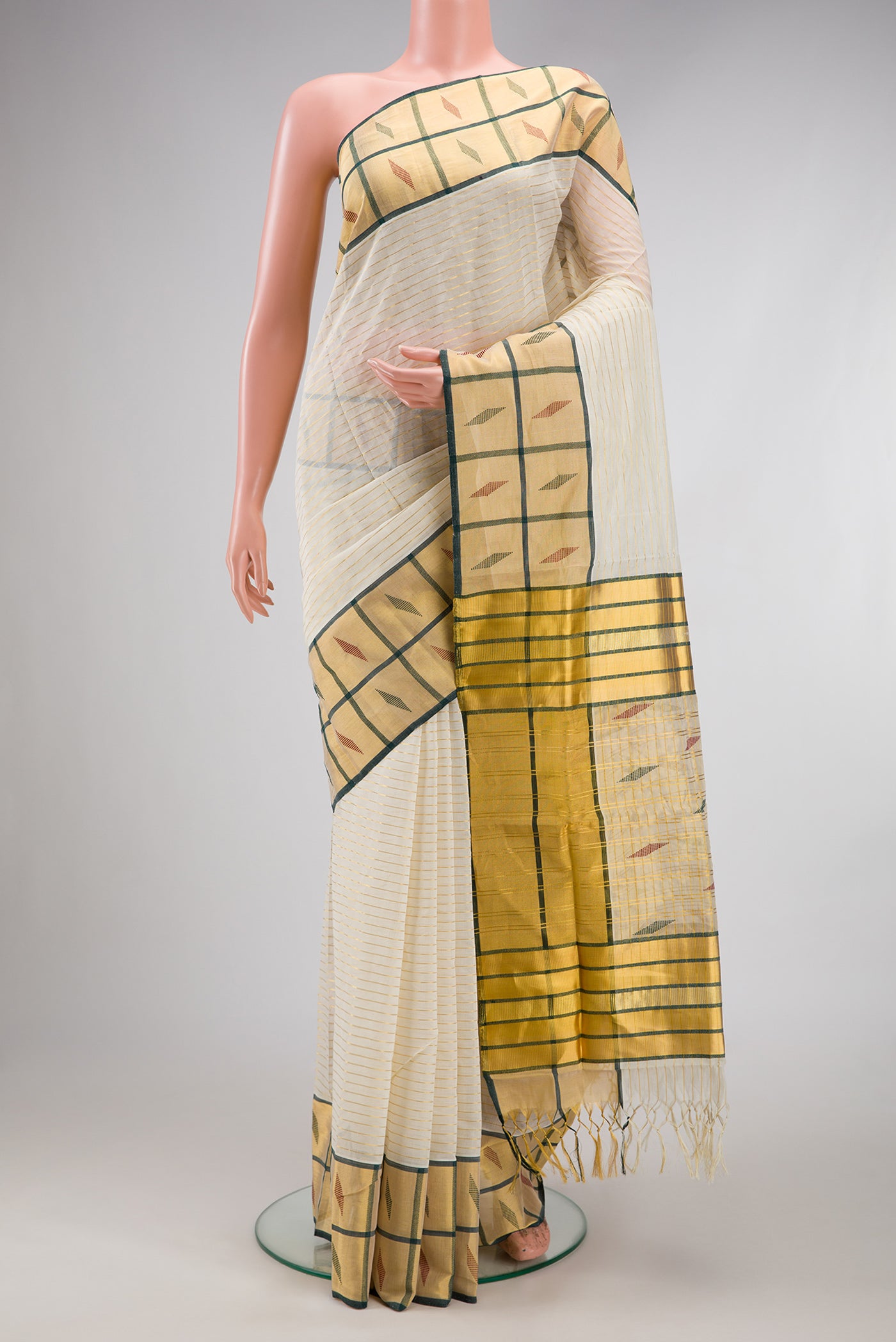 Off White Kerala Cotton Saree with Stripes on the body and Fancy Border.  displayed on a mannequin