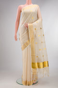 Pure Silk Off White Kerala Cotton Saree with Zari Butta on the body and Zari Border.  displayed on a mannequin