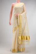 Off White Kerala Cotton Saree with Zari Butta on the body and Zari Border.  displayed on a mannequin