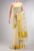 Pure Silk Off White Kerala Cotton Saree with Zari Butta on the body and Zari Border.  displayed on a mannequin