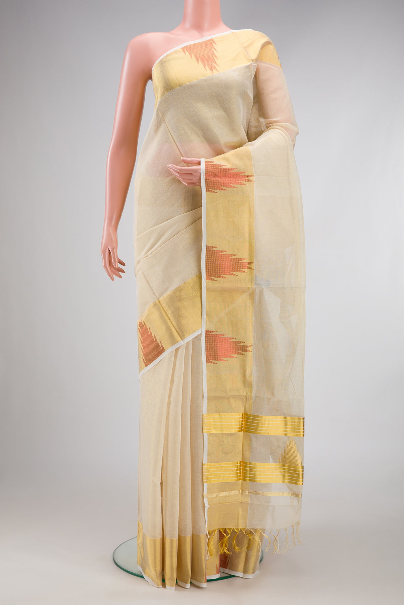 Off White Kerala Cotton Saree with Plain Body and Temple Border.  displayed on a mannequin