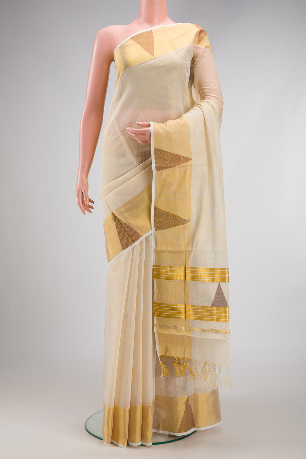 Off White Kerala Cotton Saree with Plain Body and Temple Border.  displayed on a mannequin