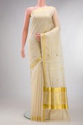 Pure Silk Off White Kerala Cotton Saree with Zari Butta on the body and Zari Border.  displayed on a mannequin