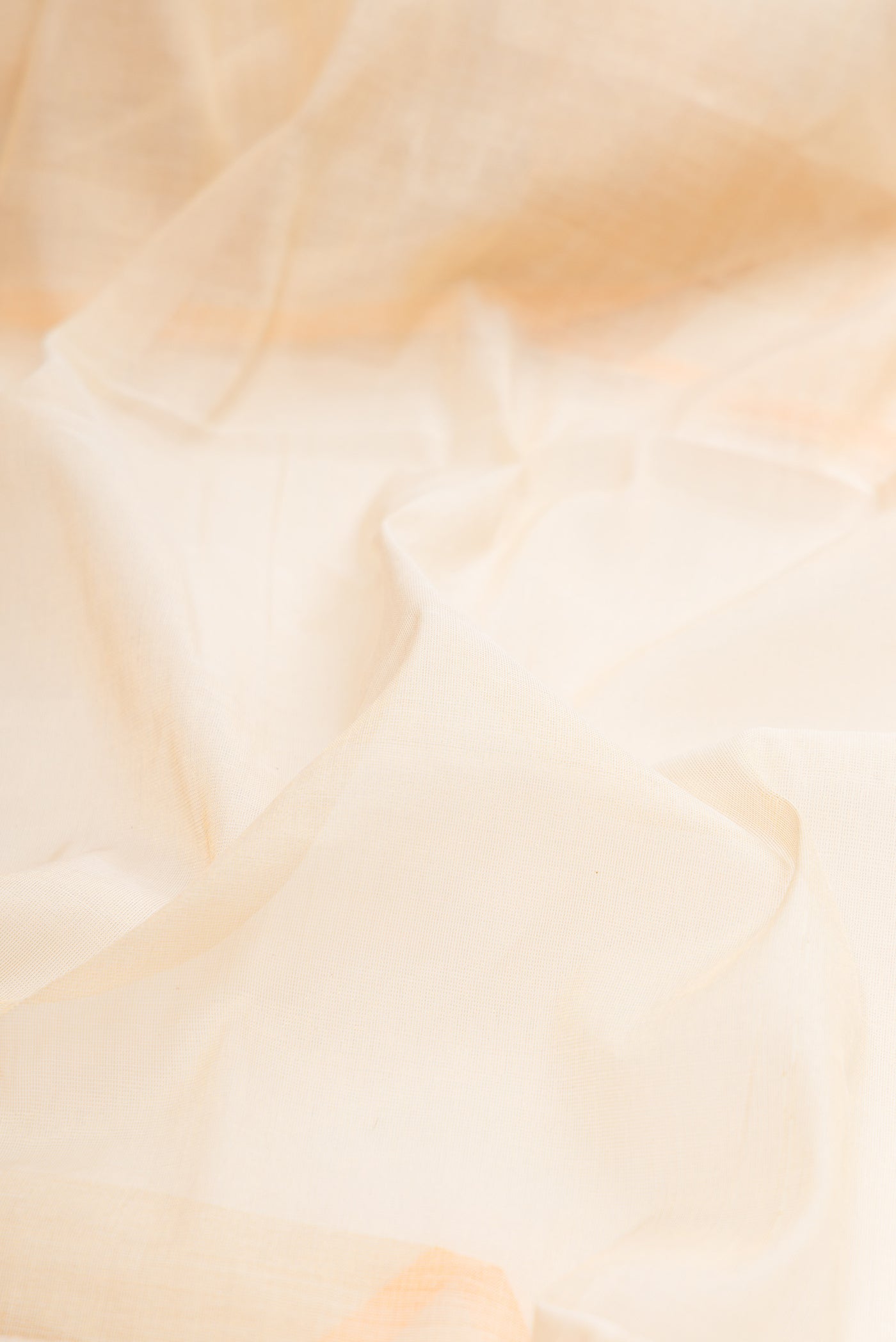 Close up of Off White Kerala Cotton Saree with Plain Body and Temple Border.  displaying folds